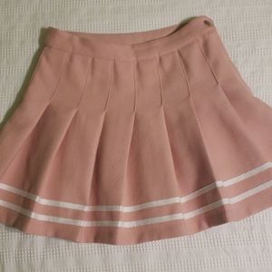 Pink pleated tennis skirt